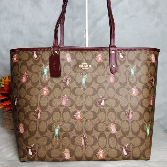 Coach Handbags - COACH REVERSIBLE CITY TOTE WITH ANIMAL PRINTS